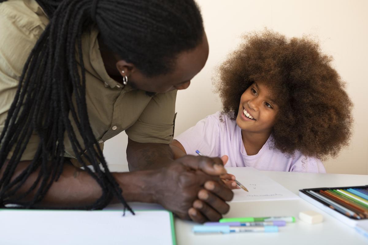 father-helping-his-daughter-with-homework